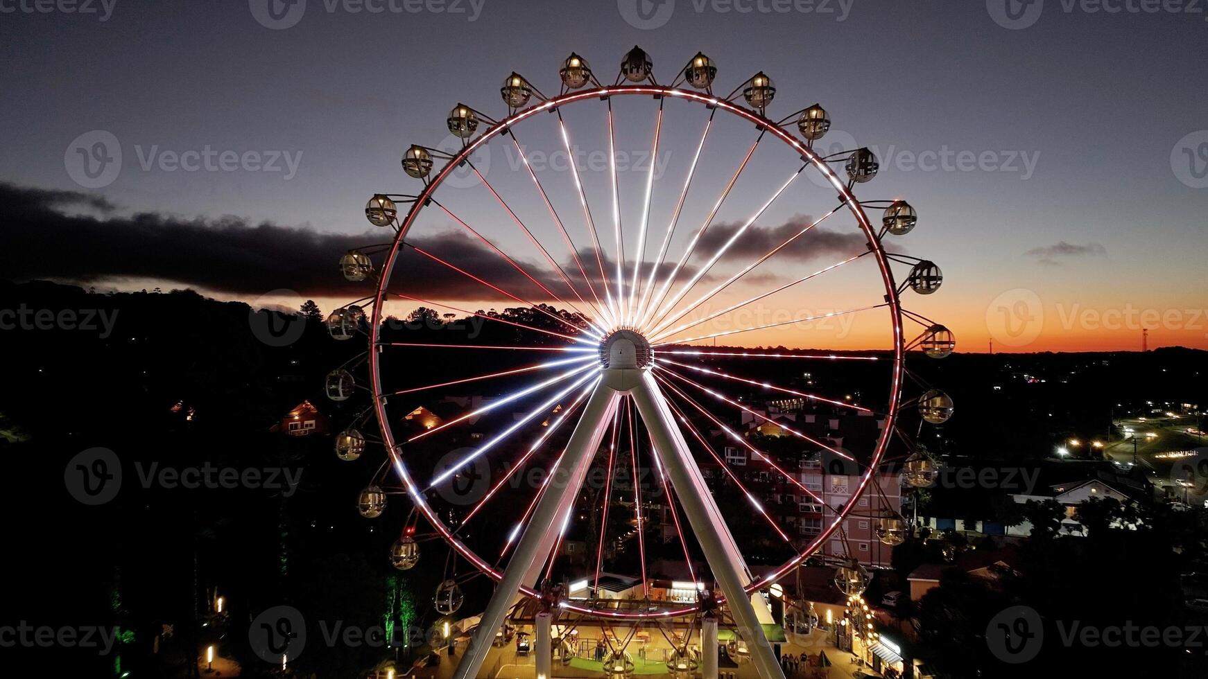 Outdoors Illuminated Ferris Wheel in Canela Rio Grande do Sul Brazil. photo