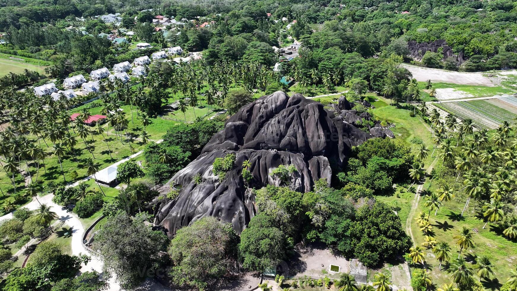 Famous Giant Union Rock in La Digue Island Victoria Seychelles. photo