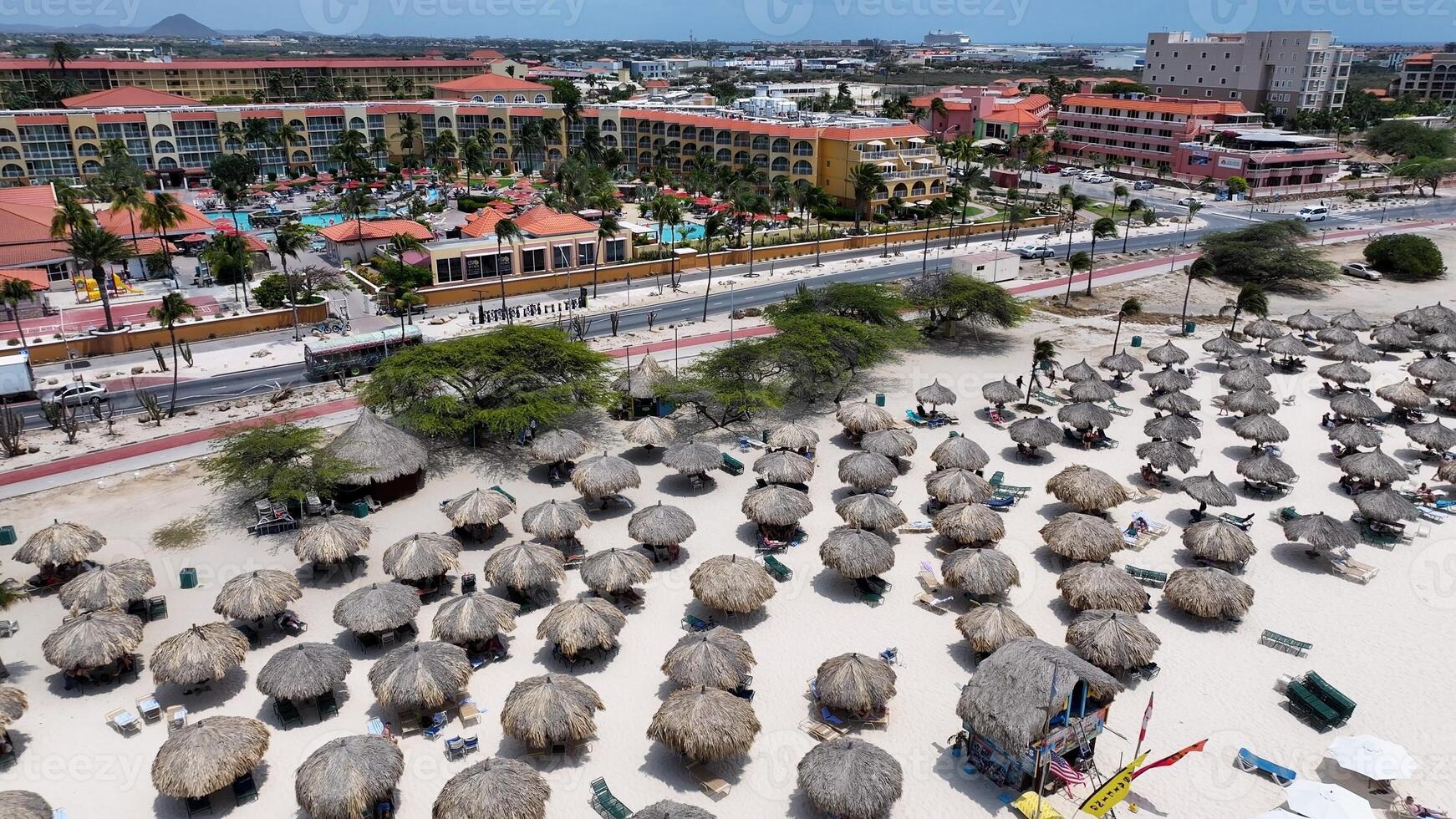Aerial Beach Umbrellas in Eagle Beach Oranjestad Aruba. photo