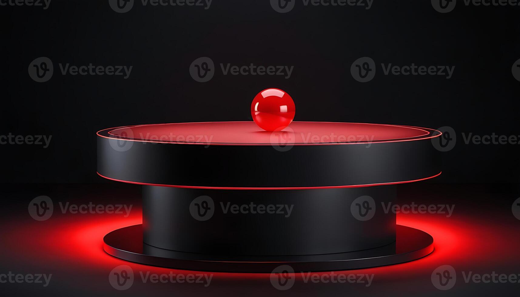 A red ball sits on top of a black table photo