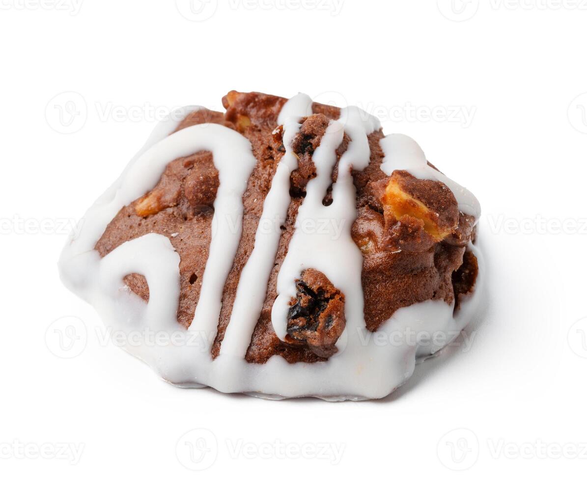 Delicious chocolate cookie with white icing drizzle on a plain background perfect for dessert lovers photo