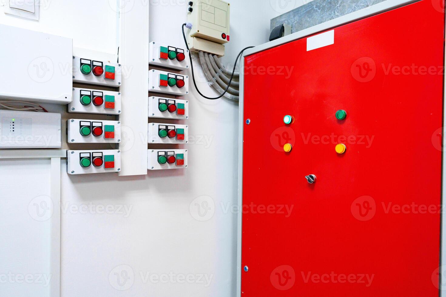Control panel with various switches and indicators in a utility room designed for efficient operation photo