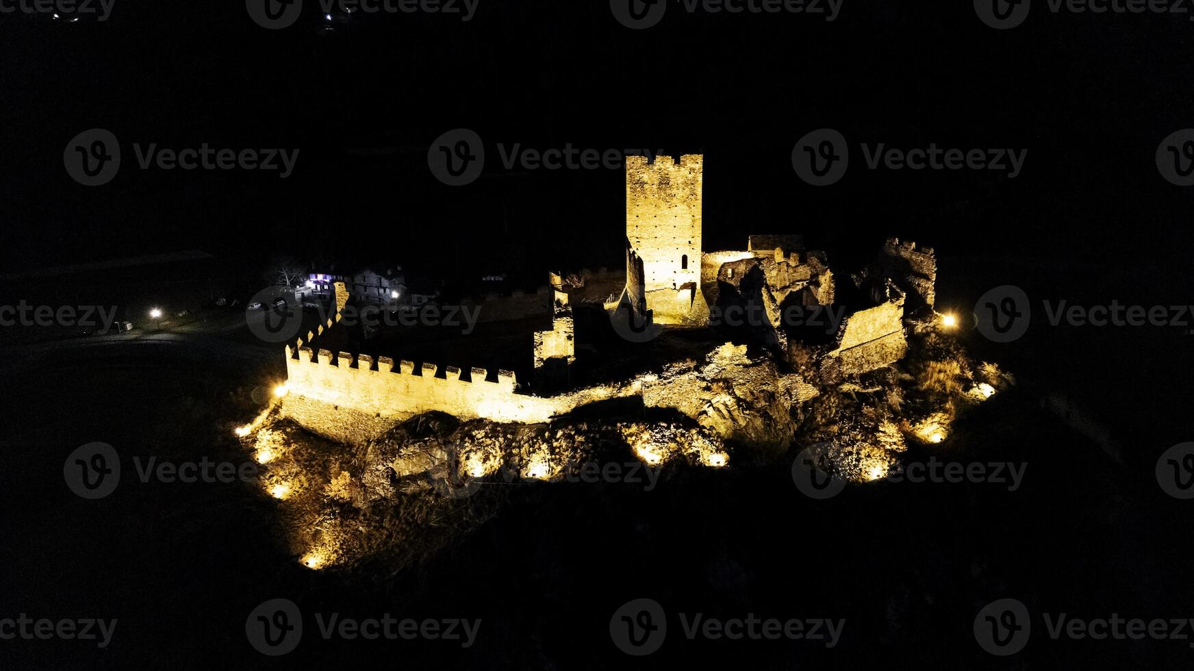 Night aerial view of the castle of Cly Saint Denis Aosta Valley photo