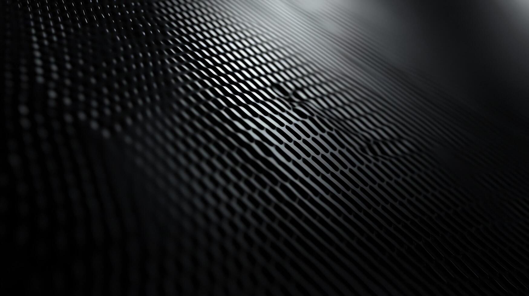 Dark metallic mesh grid reflecting light creating a modern abstract background photo