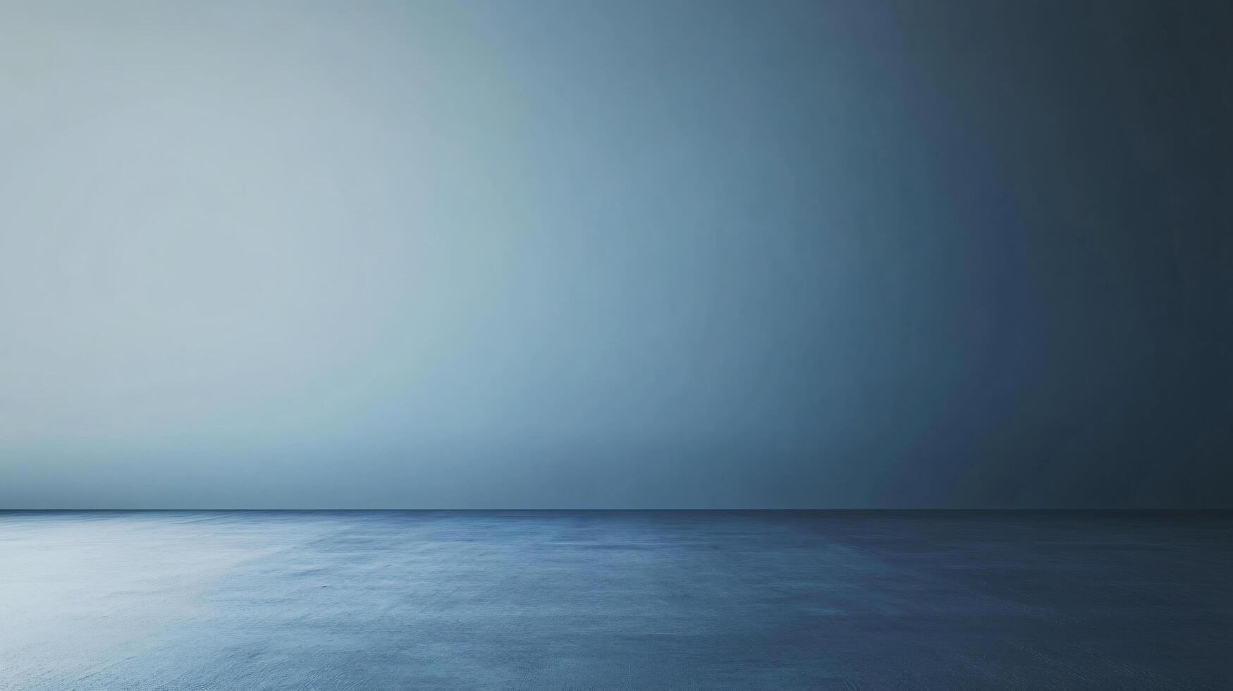 Empty polished concrete floor and gradient blue wall ideal for product placement photo