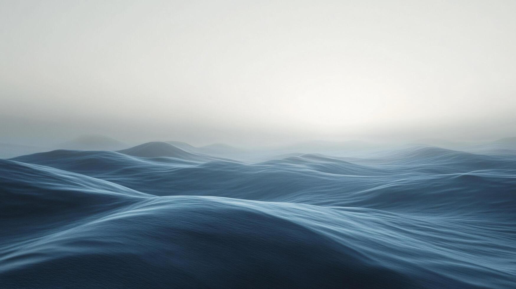 Gentle slopes bathed in soft light create a serene, minimalist landscape photo