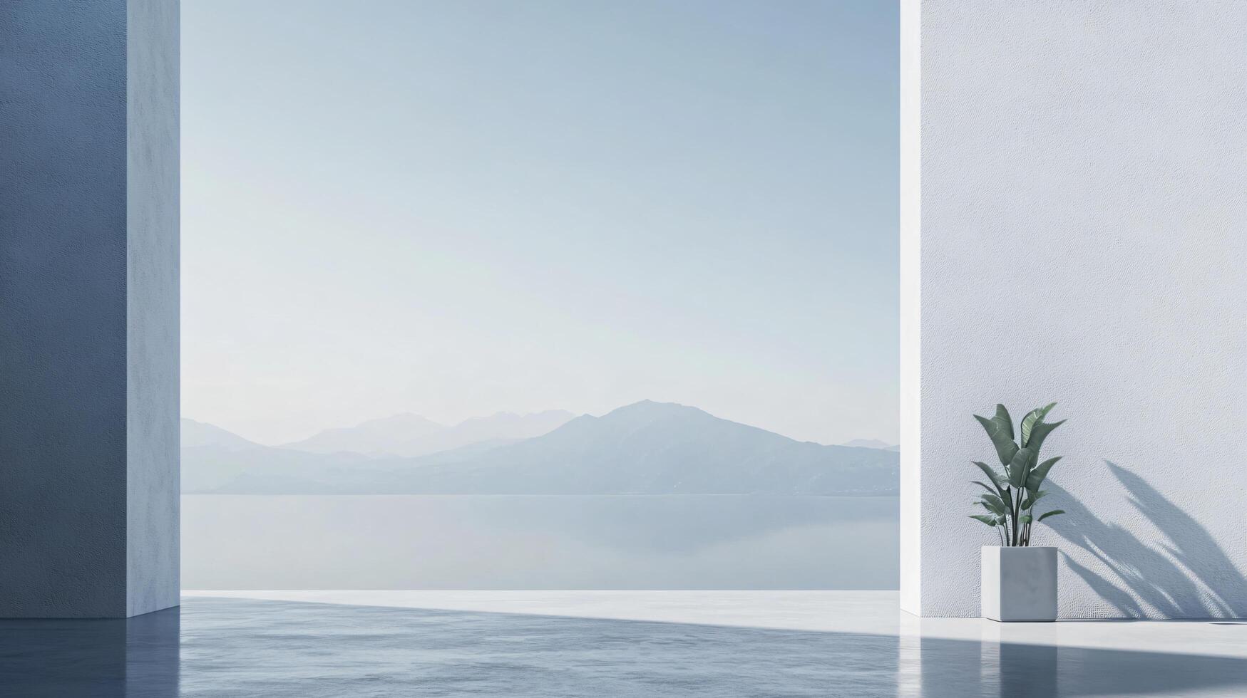 Serene view of a lake and mountains from a modern minimalist room with a potted plant photo