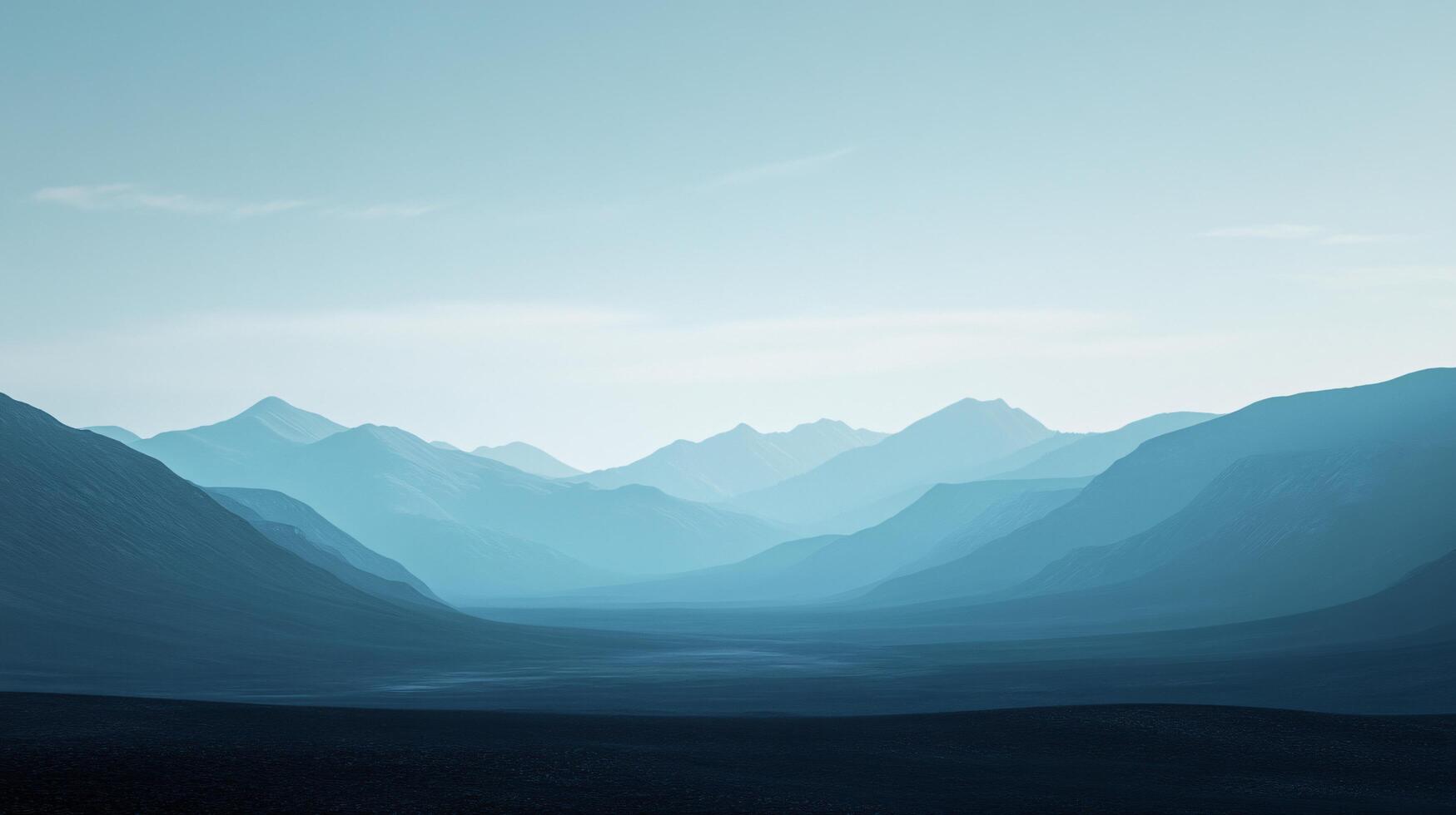 Serene landscape showcasing a vast expanse of rolling blue mountains fading into the horizon under a pale sky photo