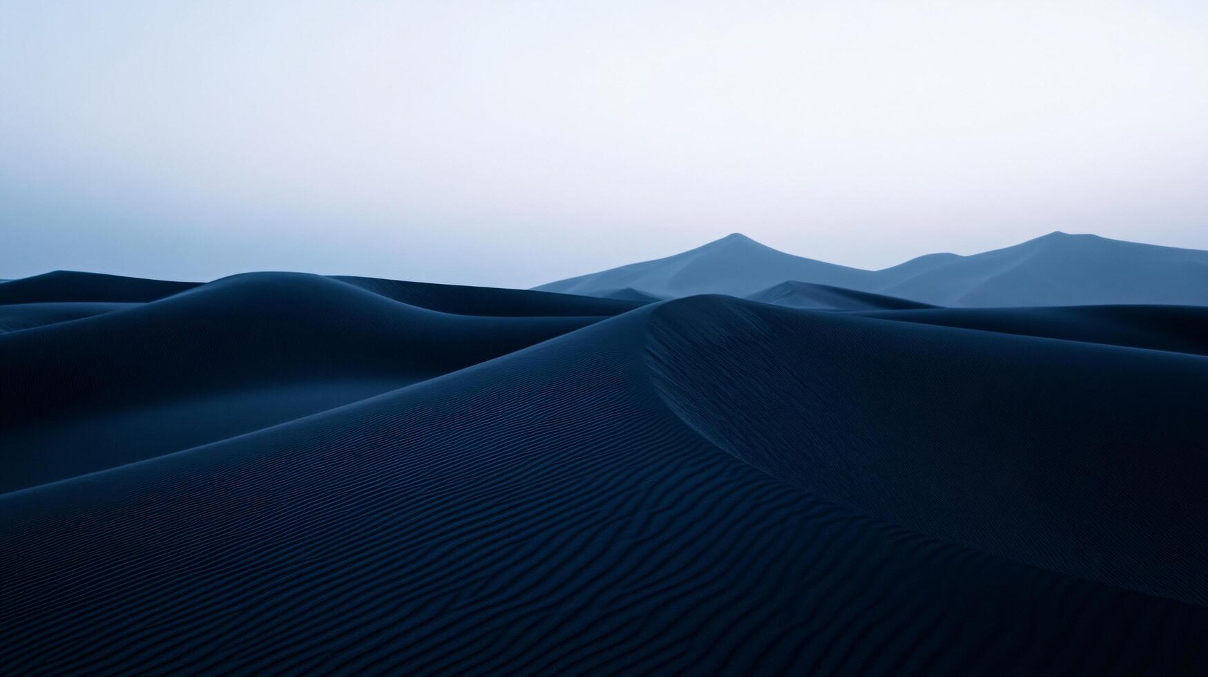 Majestic sand dunes create a mesmerizing landscape under the soft light of dawn photo