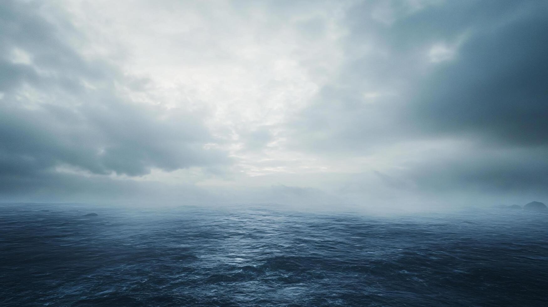 Dramatic clouds covering the horizon over a dark and stormy sea creating a moody atmosphere photo