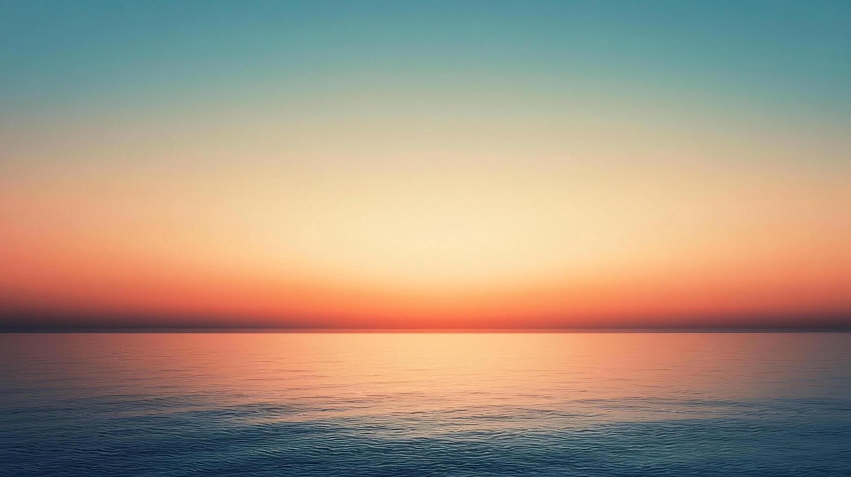 Tranquil ocean reflecting vibrant sunset colors during twilight, creating a serene and peaceful atmosphere photo