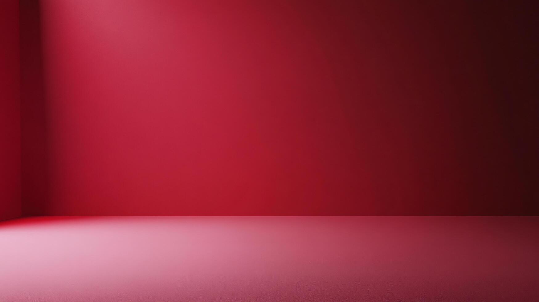 Light illuminating corner of empty room with red walls and floor, creating gradient effect photo
