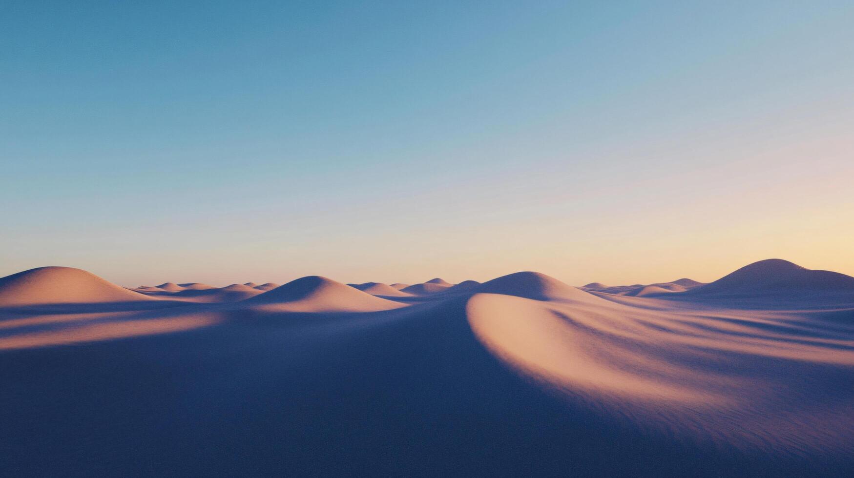 Rolling sand dunes bathe in the warm glow of the setting sun, creating a serene desert landscape photo