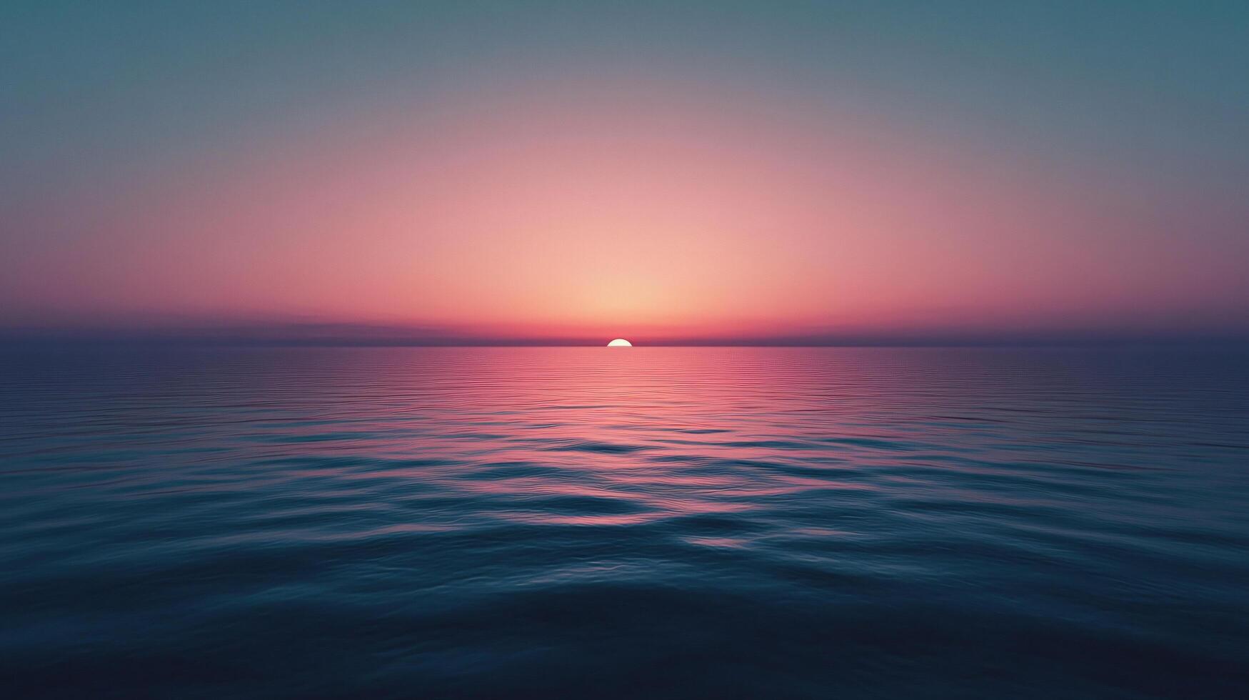 Breathtaking sunset over a calm ocean, creating a beautiful blend of pink and teal colors photo
