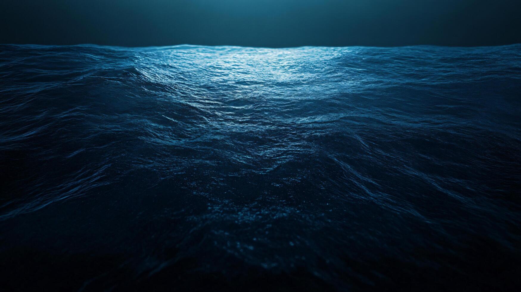 Moonlight reflecting on dark blue ocean waves at night photo