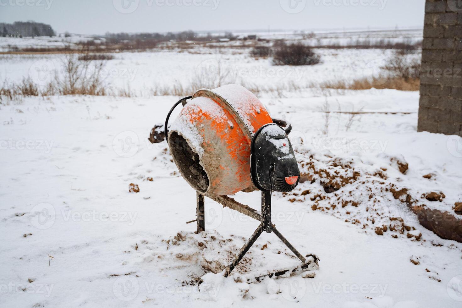 An Uniquely Designed Concrete Mixer That is Shaped Like a Sheep, Set Against the Beautiful Backdrop of a Serene Winter Landscape, Capturing a Truly Whimsical Scene photo