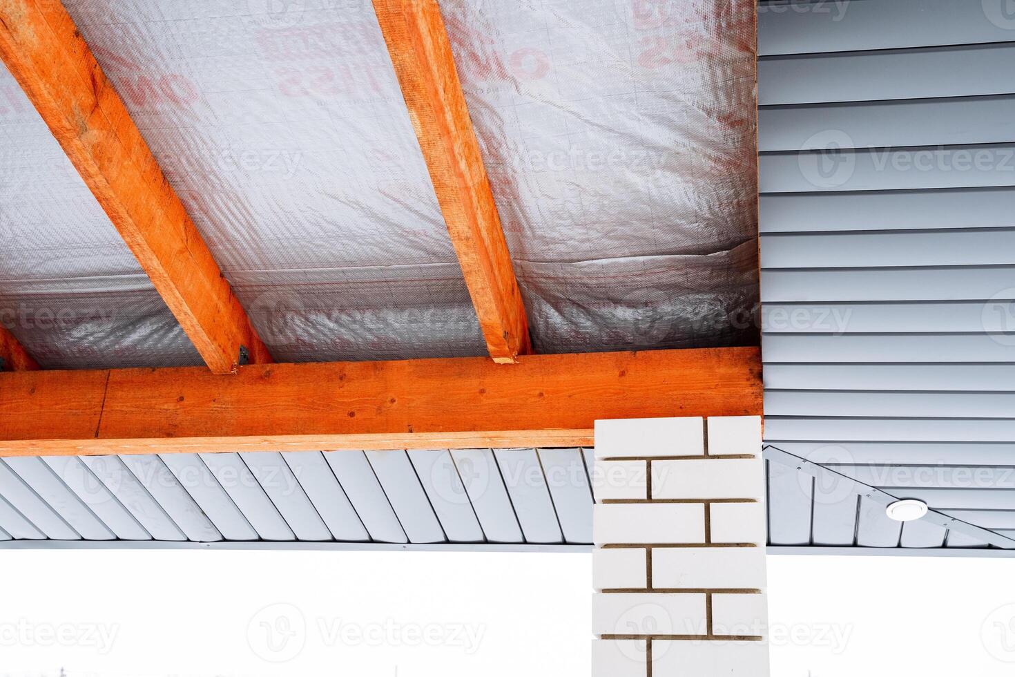 Imagine a stunning roof design with elegant wooden beams and a robust brick chimney, creating a visually striking and practical architectural layout that captivates and serves its purpose photo