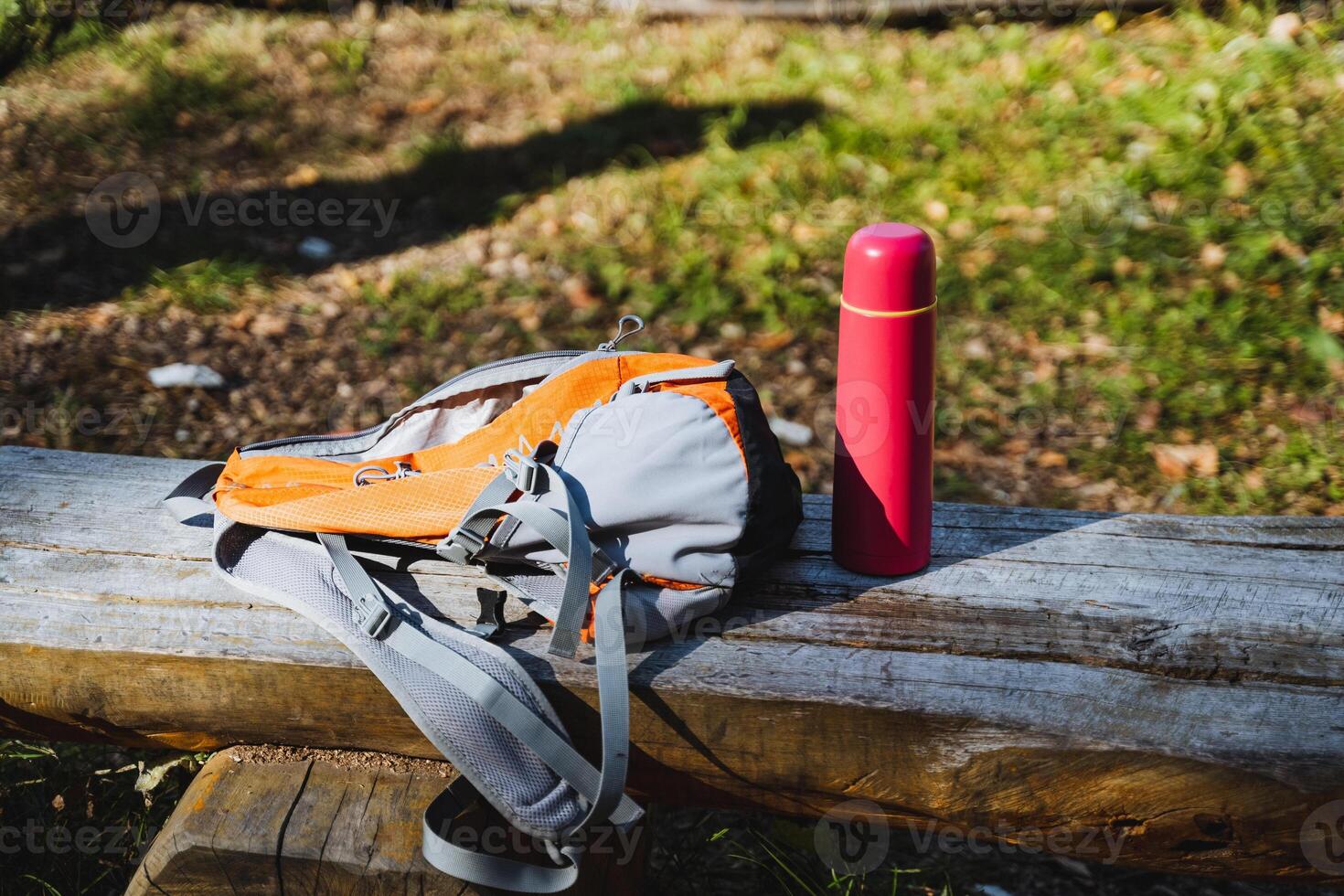 Discover stylish hiking gear, including a versatile backpack and a durable water bottle set, perfect for enjoying natures beauty photo