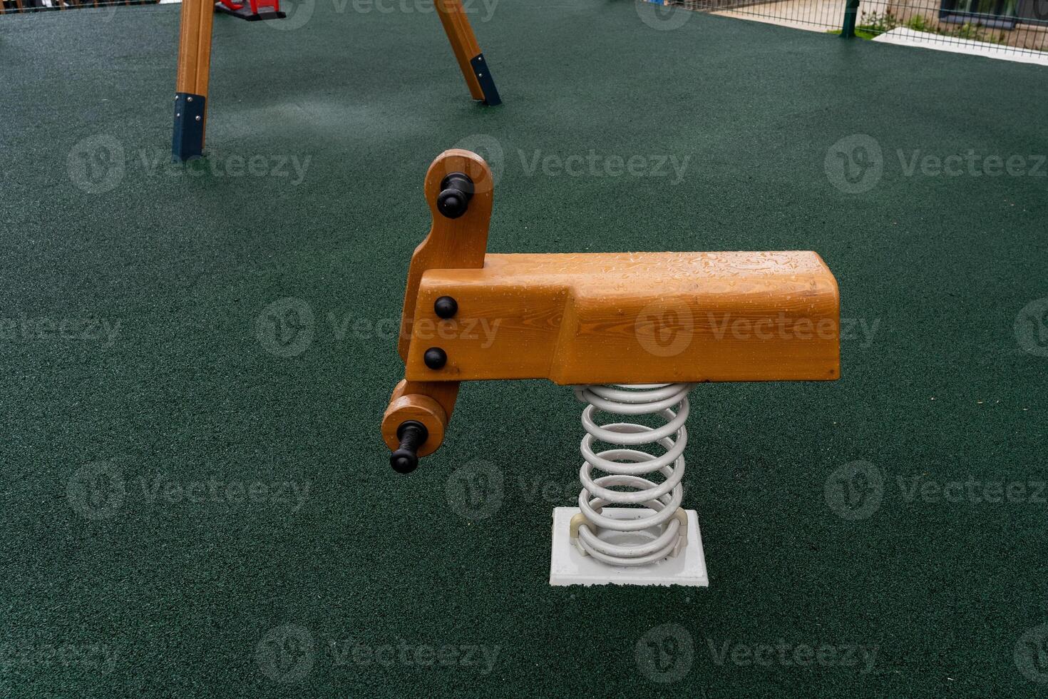 Explore the vibrant Playground Spring Rider designed for childrens fun, entertainment, and active engagement photo