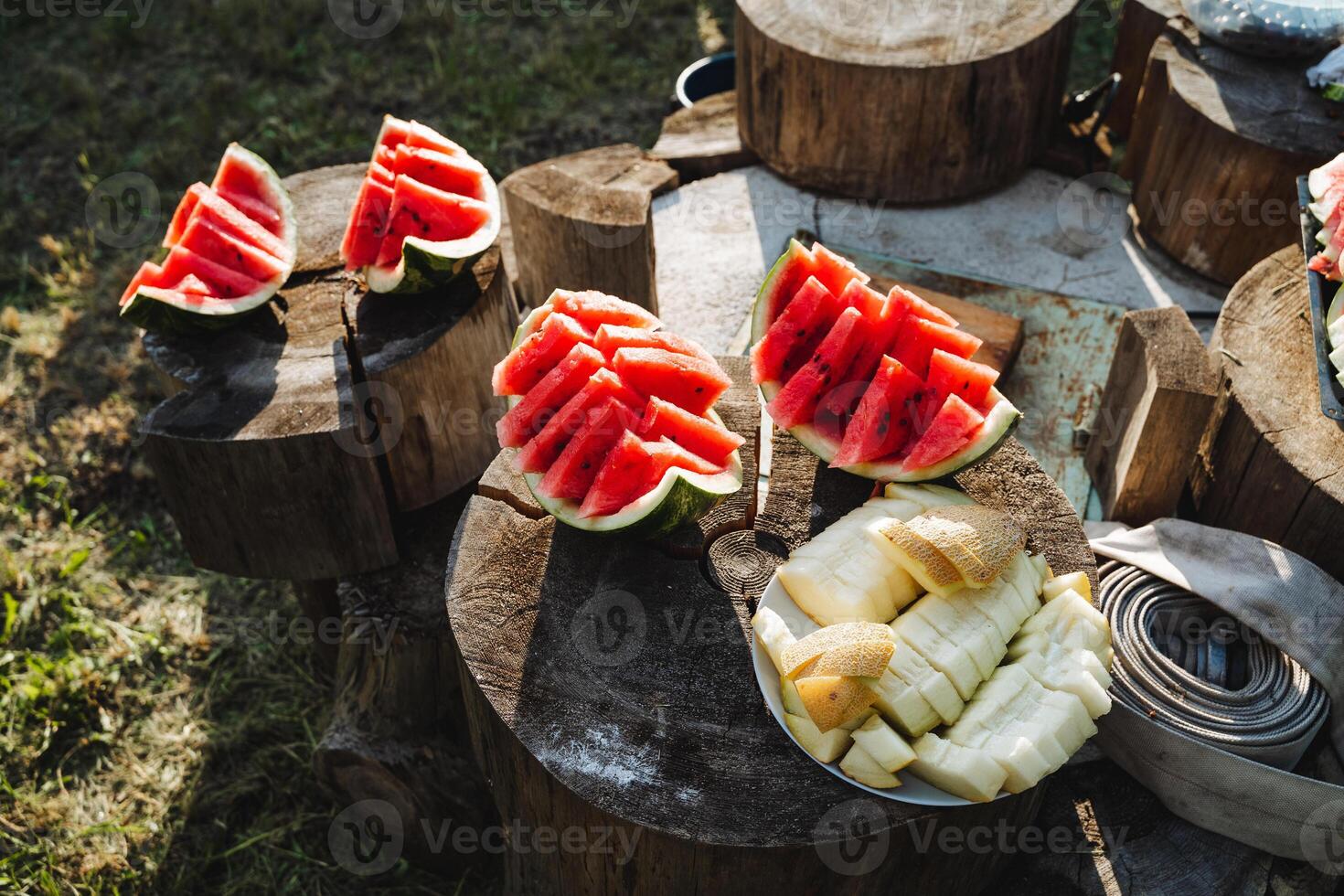 The photo features a stylish display of watermelon and bananas on a wooden board, creating a contemporary and simple food arrangement that captures attention with its elegance