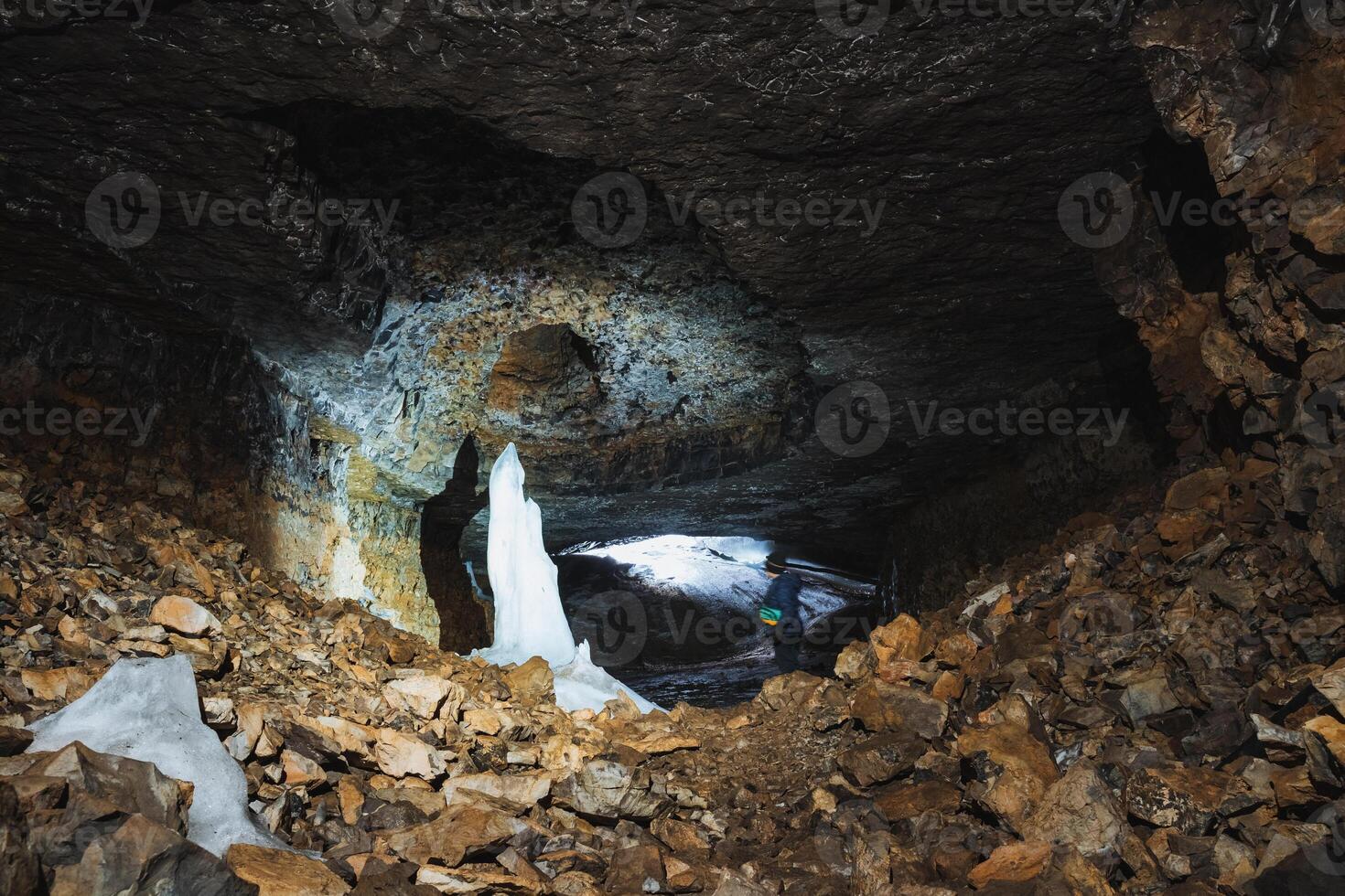 I find myself deeply immersed in an exhilarating adventure as I explore a mysterious cave filled with stunning and remarkable geological features photo