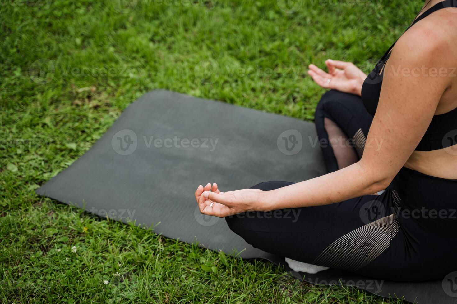 Engaging in yoga and meditation in nature helps achieve inner balance, serenity, and peace, promoting tranquility and harmony within oneself for overall wellbeing photo