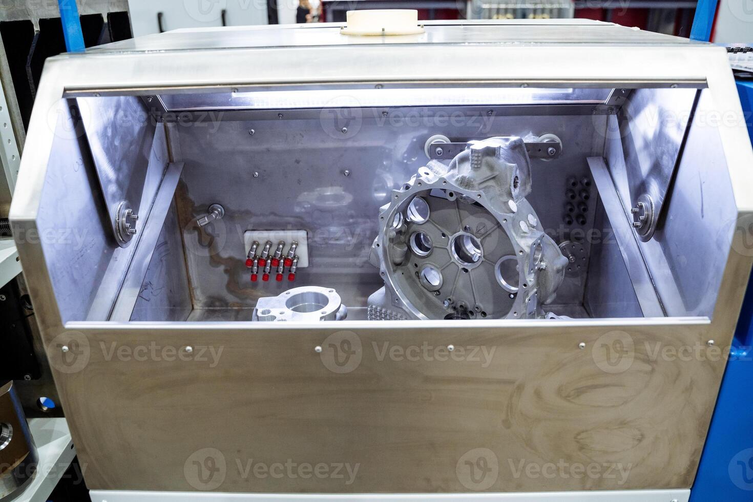 Inside a sturdy stainless steel box, there is a gear that plays an important role, highlighting its mechanical significance and versatility for various applications and uses photo