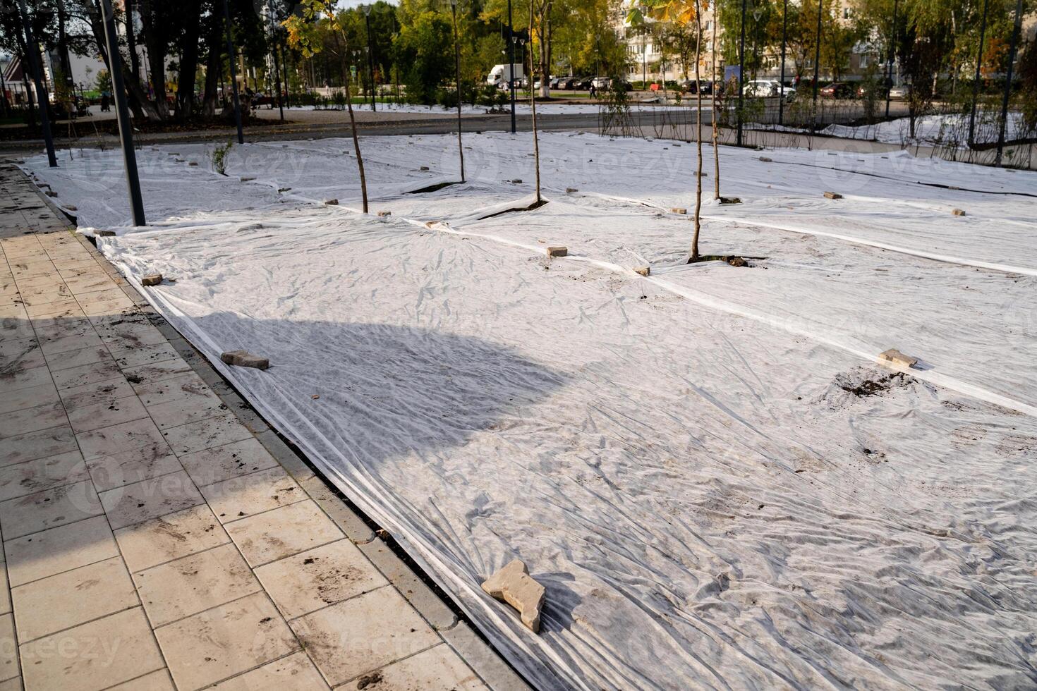 Properly preparing a construction site involves using protective coverings and establishing a sturdy framework to ensure safety and efficiency photo