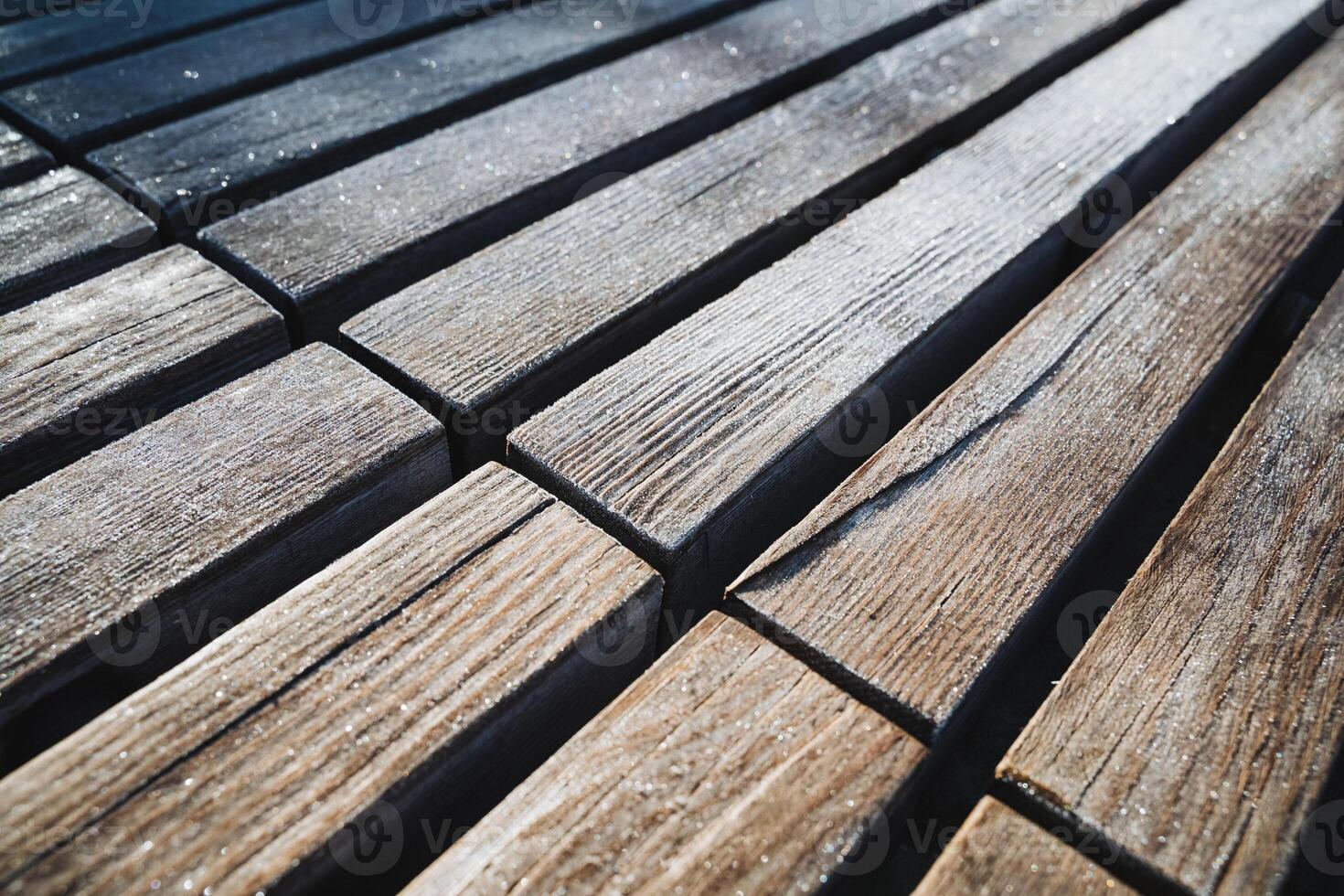 This image features a close up of a beautiful wooden floor showcasing a diagonal pattern that enhances the visual appeal of the hardwood used in its making, giving it character and style photo