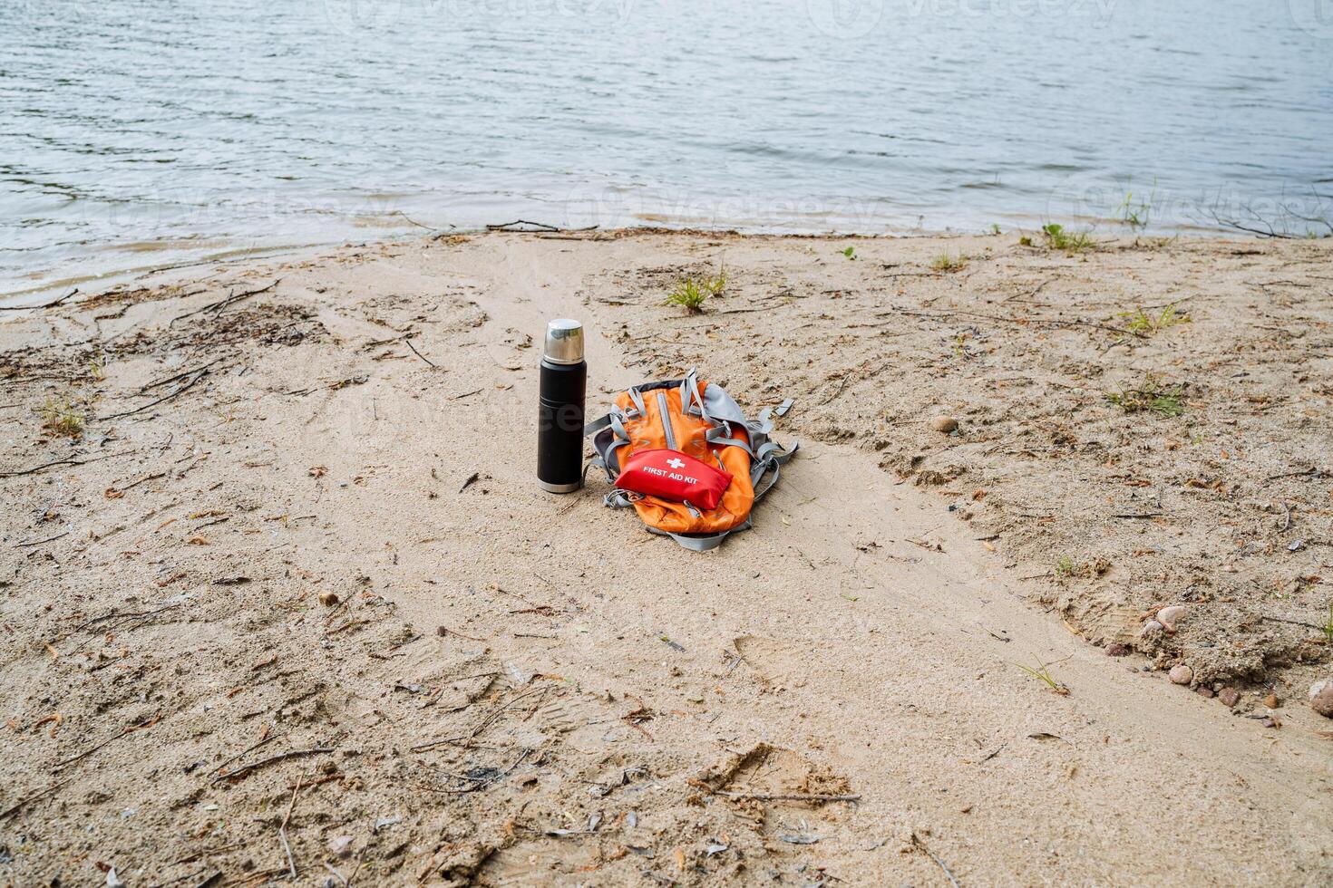 Get ready for an exciting outdoor adventure with necessary equipment by the lakeshore to fully immerse in nature. Prepare for activities like hiking, camping, and relaxation photo