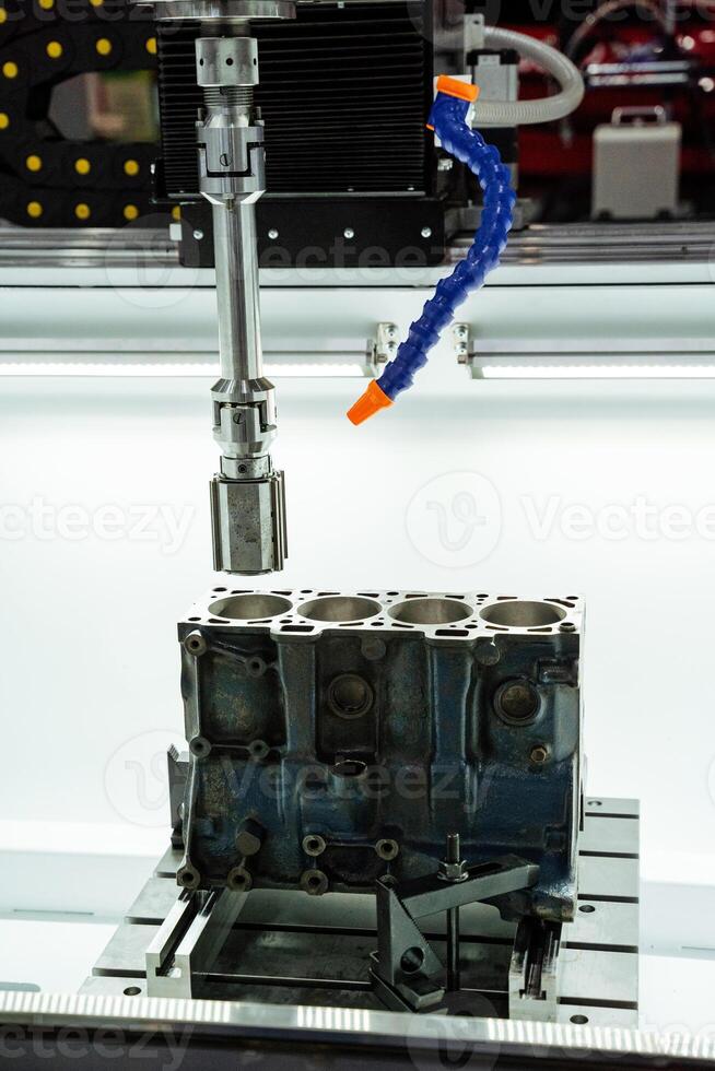 Setting up precision machining processes for the fabrication of automotive engine blocks is crucial for manufacturing efficiency and quality control photo