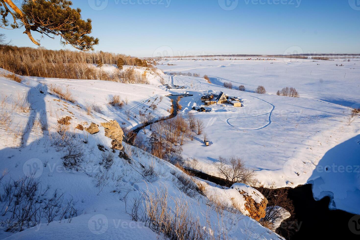 Shadow of a man on a mountainside, winter landscape in a beautiful place, trekking in the mountains, winter hiking, riverbed. photo