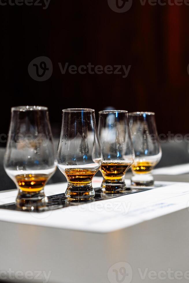 Exploring flavors during whiskey tasting session in an upscale bar photo