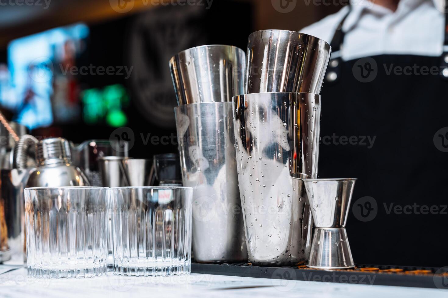 Cocktail preparation at an alcohol tasting event featuring mixing tools photo