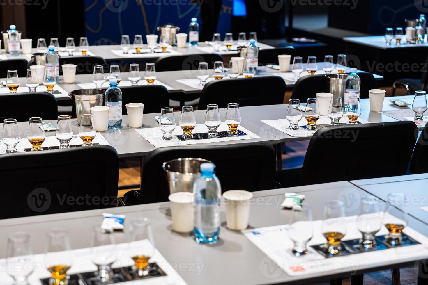A vibrant alcohol tasting setup at an evening cocktail preparation event photo