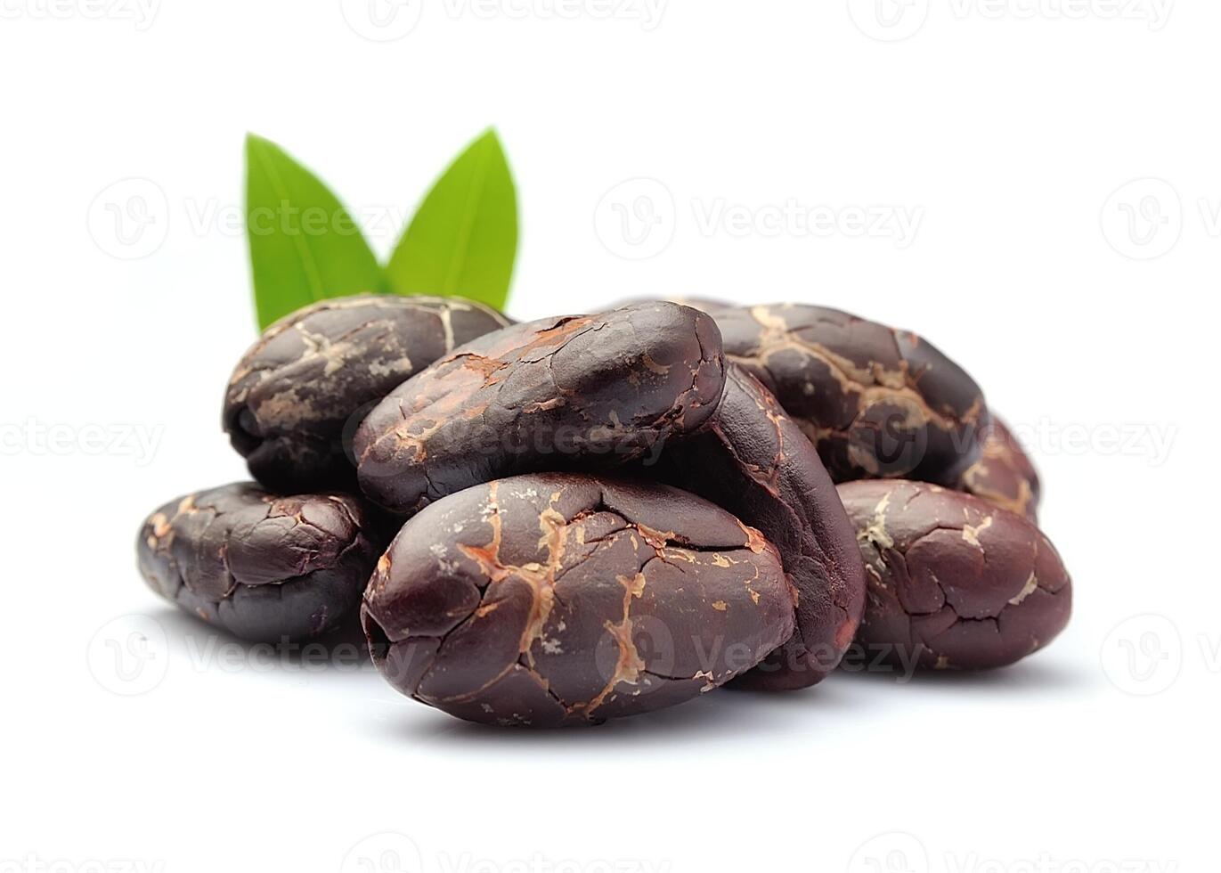 Cocoa beans with leaves. Healthy food ingredient photo