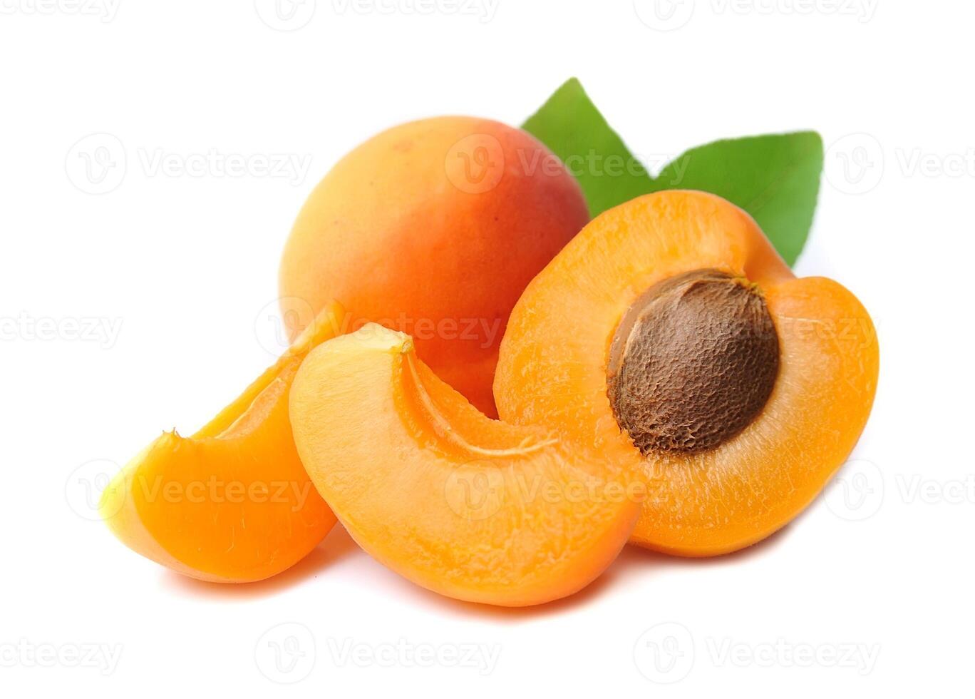 Apricot with leaves on white backgrounds photo