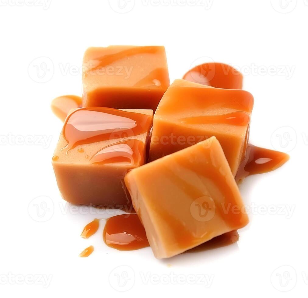 Caramel candies with caramel topping photo