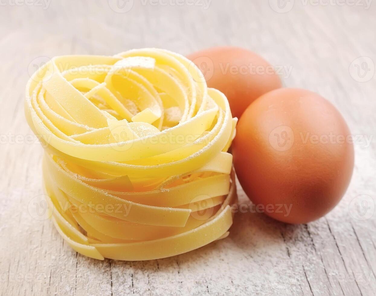 Pasta tagliatelle with egg photo