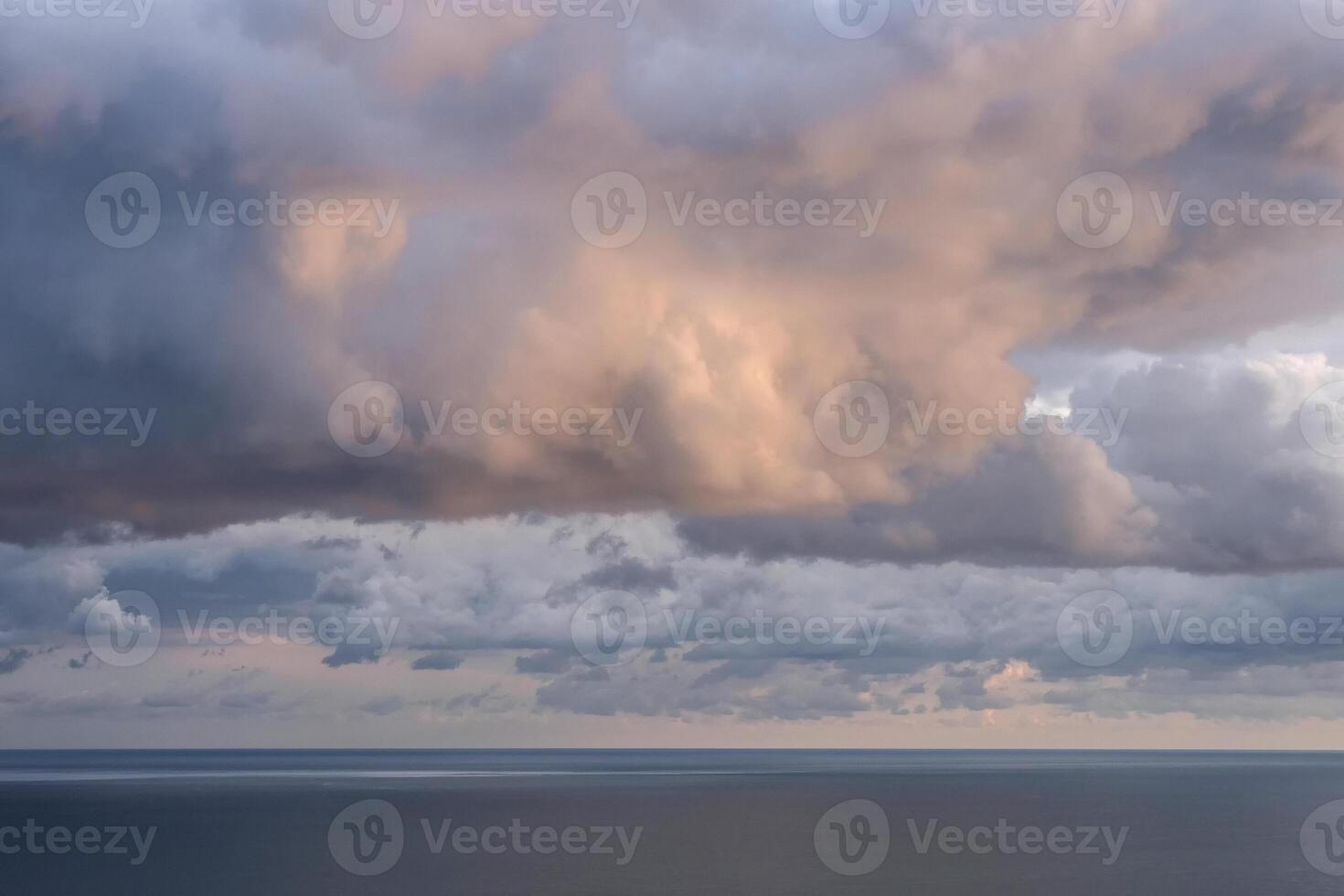 Dramatic sunset with a twilight blue color of the sky and clouds. photo