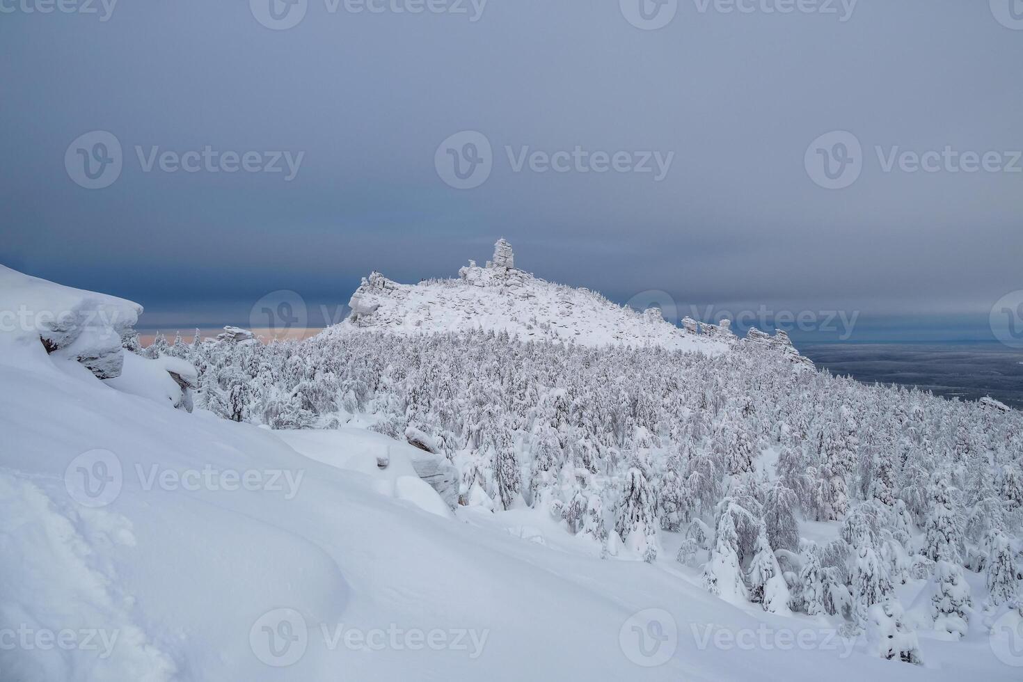 Stone pillars of weathering in winter. photo