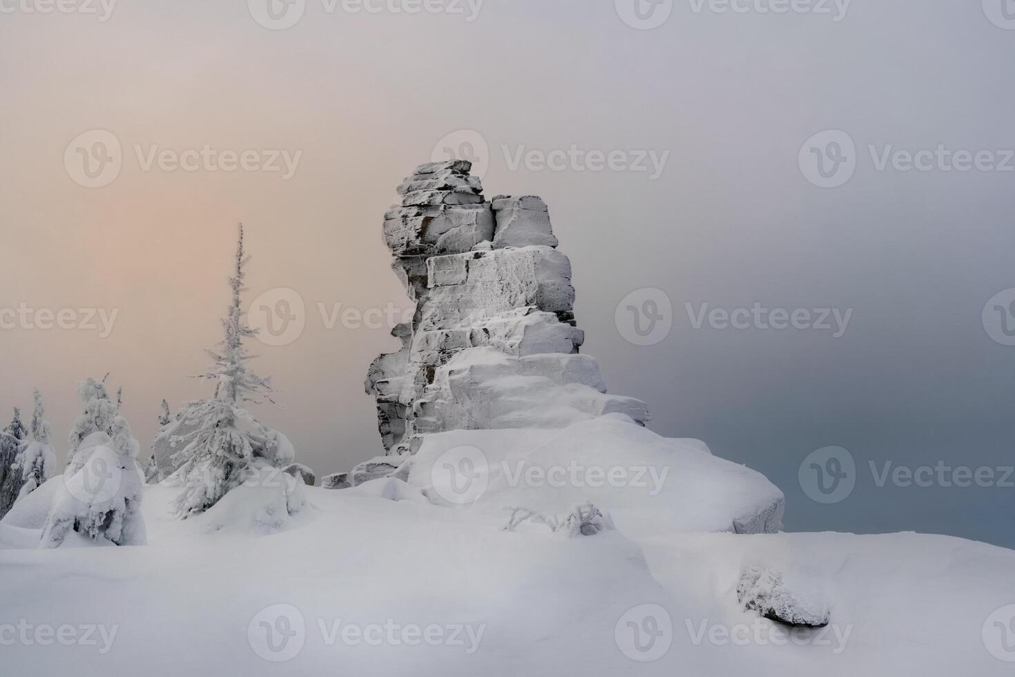 Cliff snow-covered mountains. photo