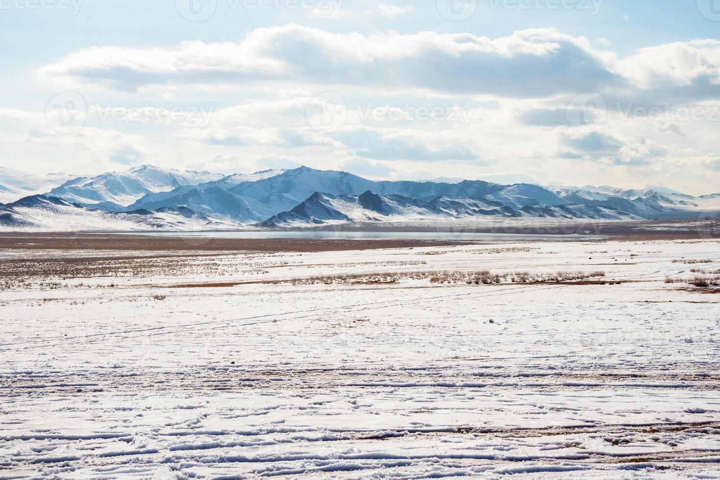 Snow mountain steppe in Mongolia. photo