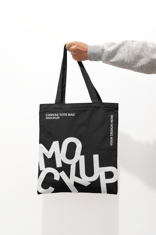 Hand Holding a Tote Bag Mockup psd