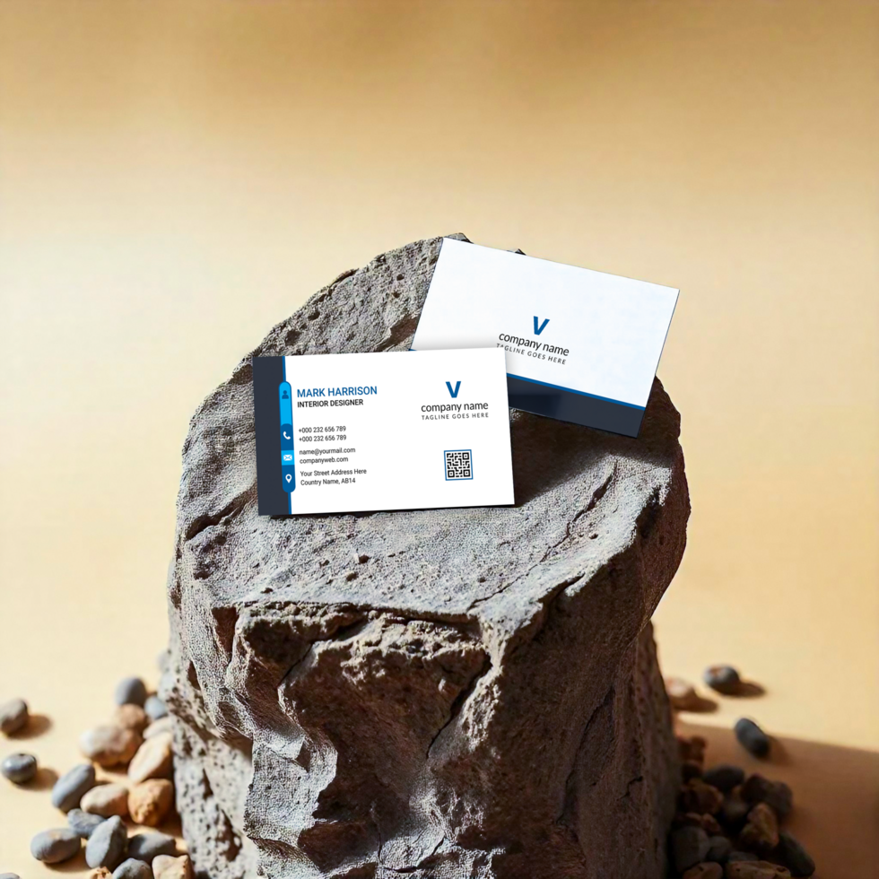 The business card mockup is arranged on stone, giving it an earthy, modern feel psd