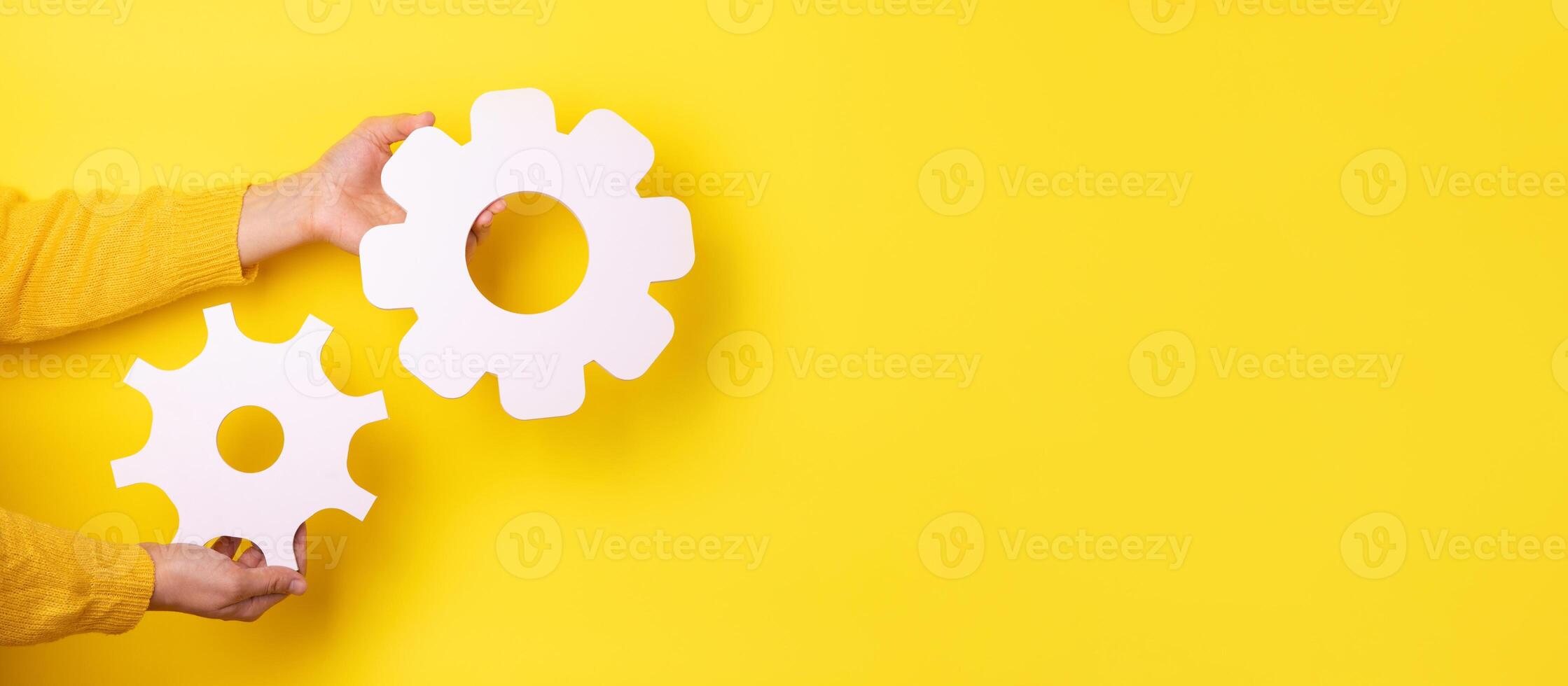 gear in hands panoramic photo