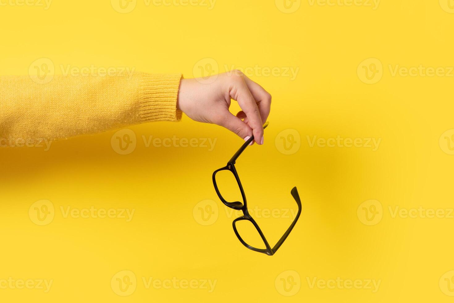 glasses in hand photo