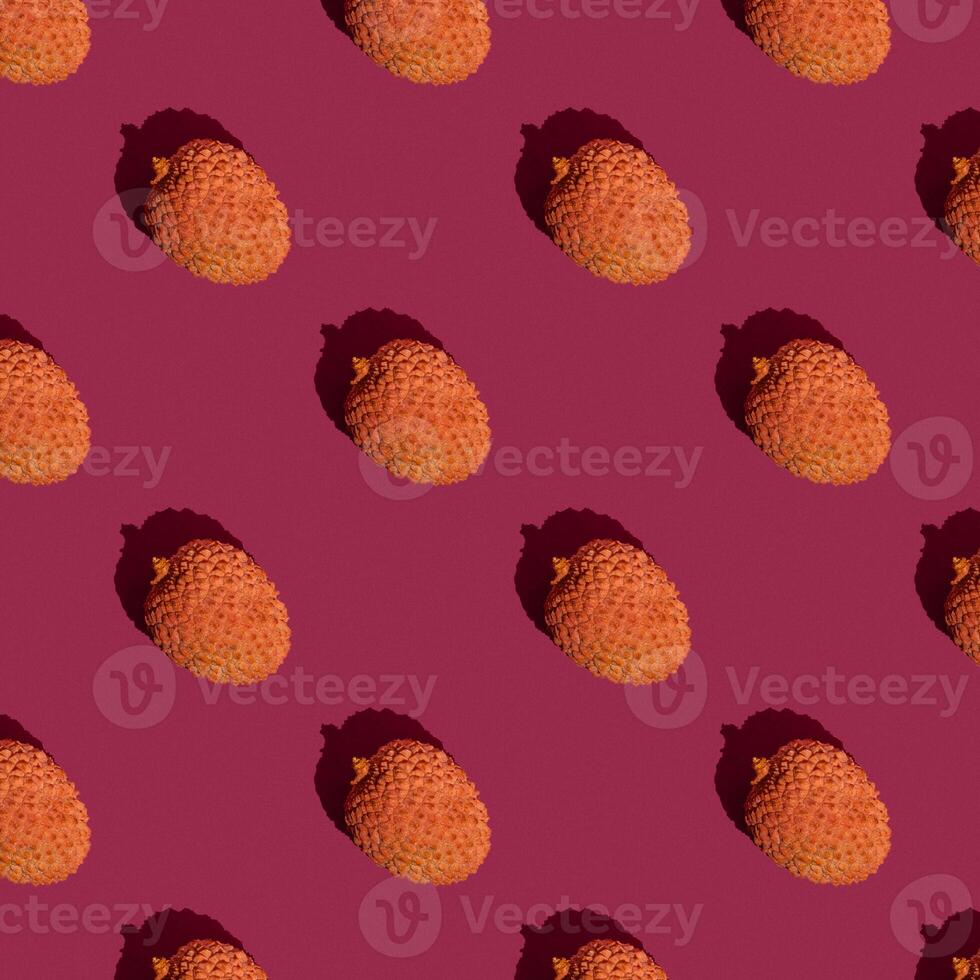 Lychee fruits on pink background, lychee pattern photo