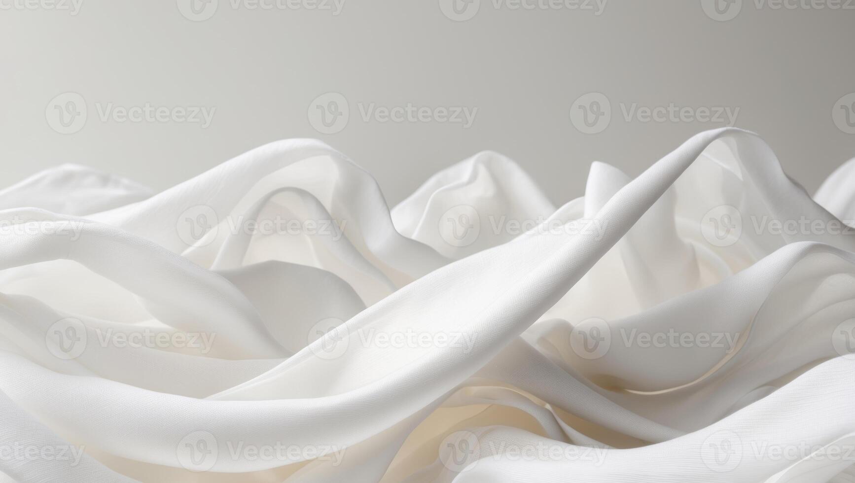 Abstract white fabric waves creating a dynamic and flowing visual texture photo