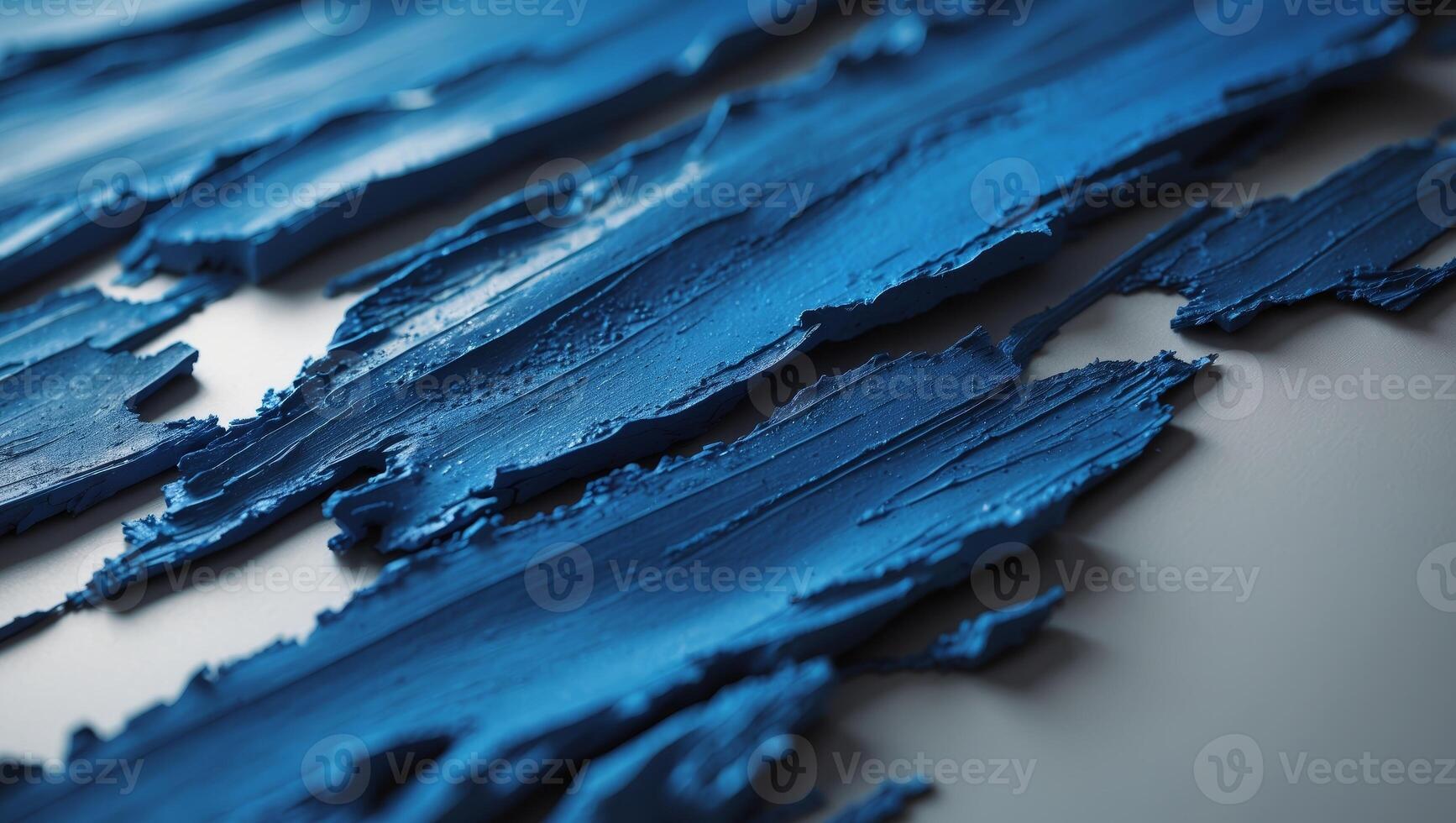Abstract blue textured wall art with rough brush strokes and dark gradient. photo